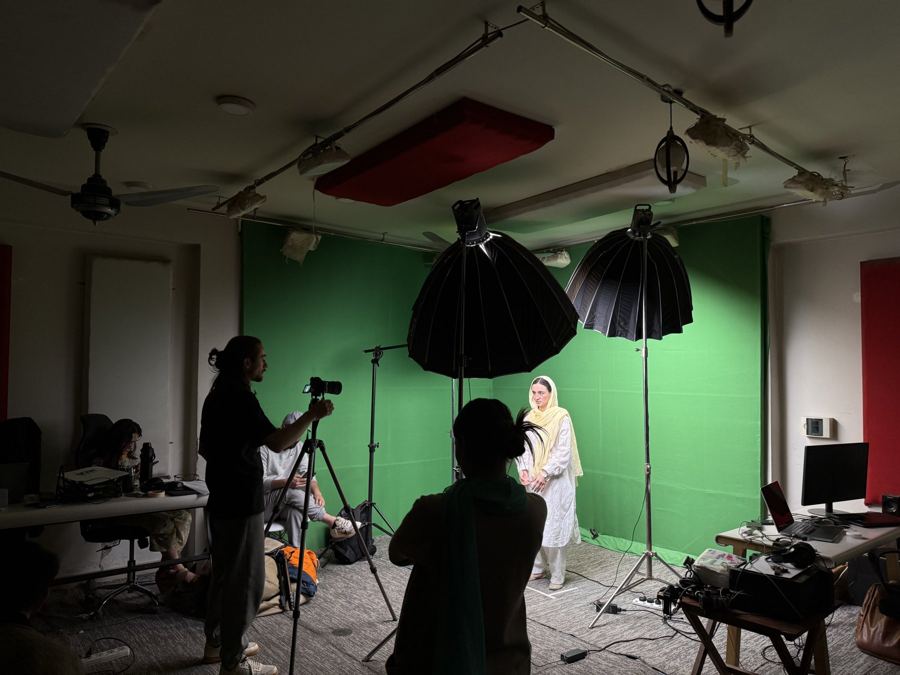 A woman from the mountains telling her story in the studio